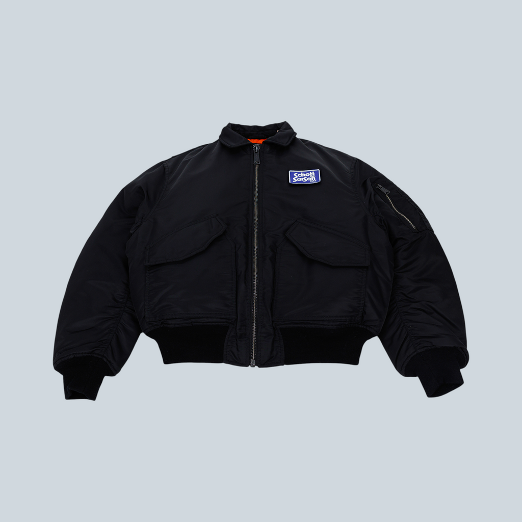 Blouson bomber noir Saison x Schott style années 90 avec fermeture éclair robuste, col et poignets côtelés