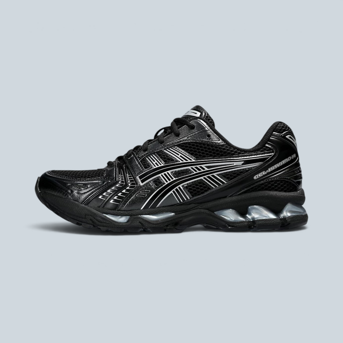 Baskets Saison Asics Gel Kayano 14 noires et argentées avec détails en mesh et technologie d'amorti visible