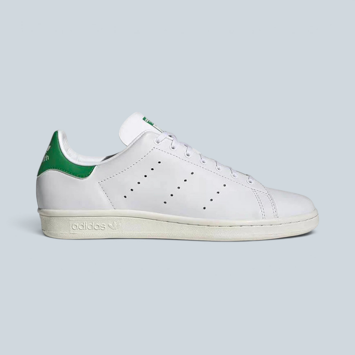 Baskets Adidas Stan Smith 80s blanches en cuir avec talon vert emblématique, vendues par Saison