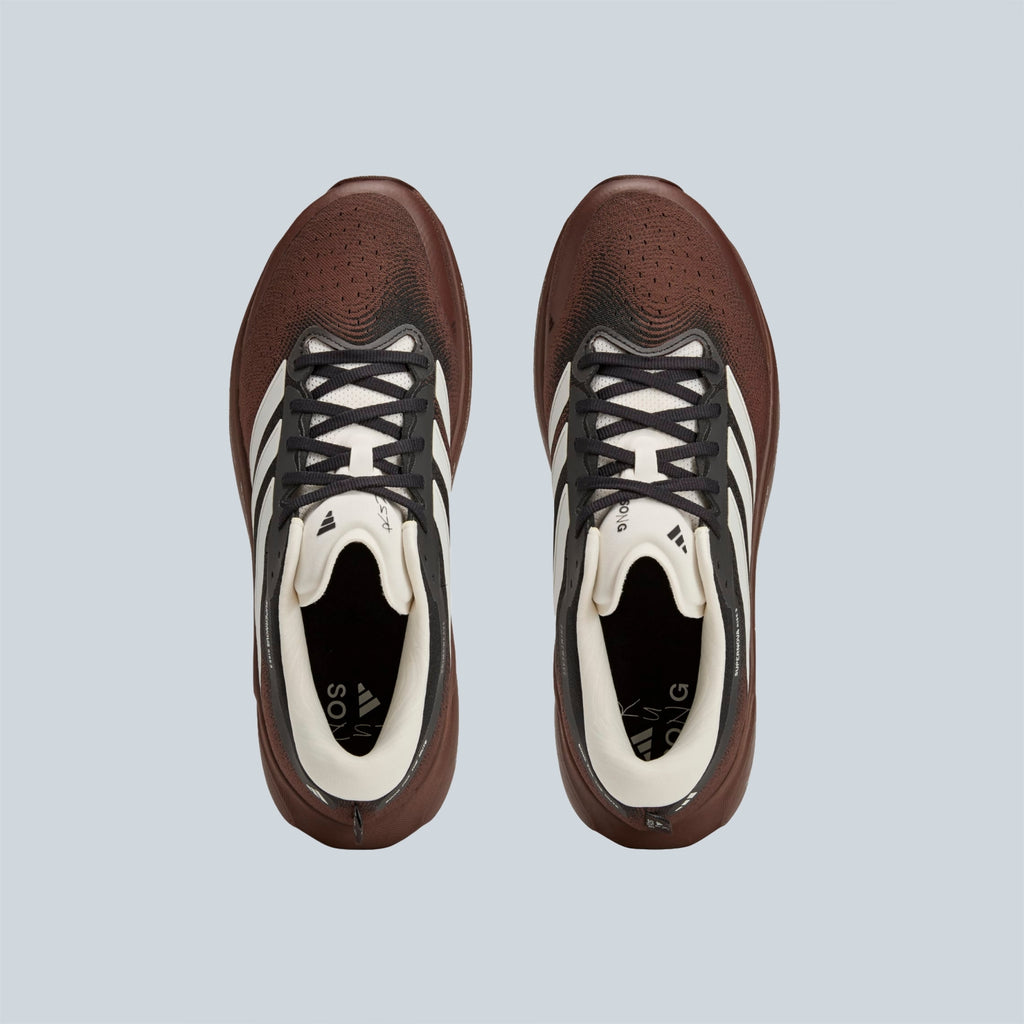 SUPERNOVA RISE 3 RUNNING SHOE - BROWN