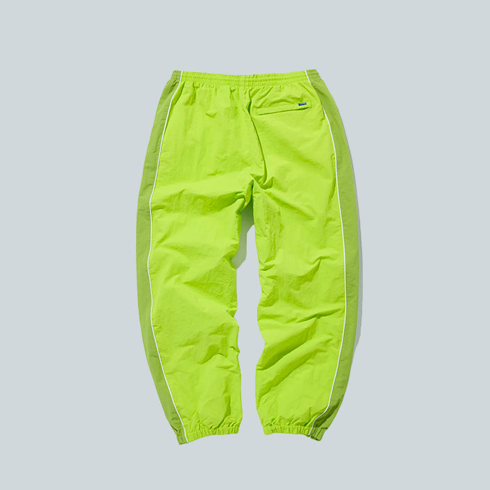 AWAKE NY DOUBLE PANEL TRACK PANTS - LIME image 1
