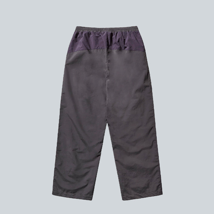 UMBRO ROSE CREST TRACK PANTS - DARK GRAY DARK PURPLE image 1