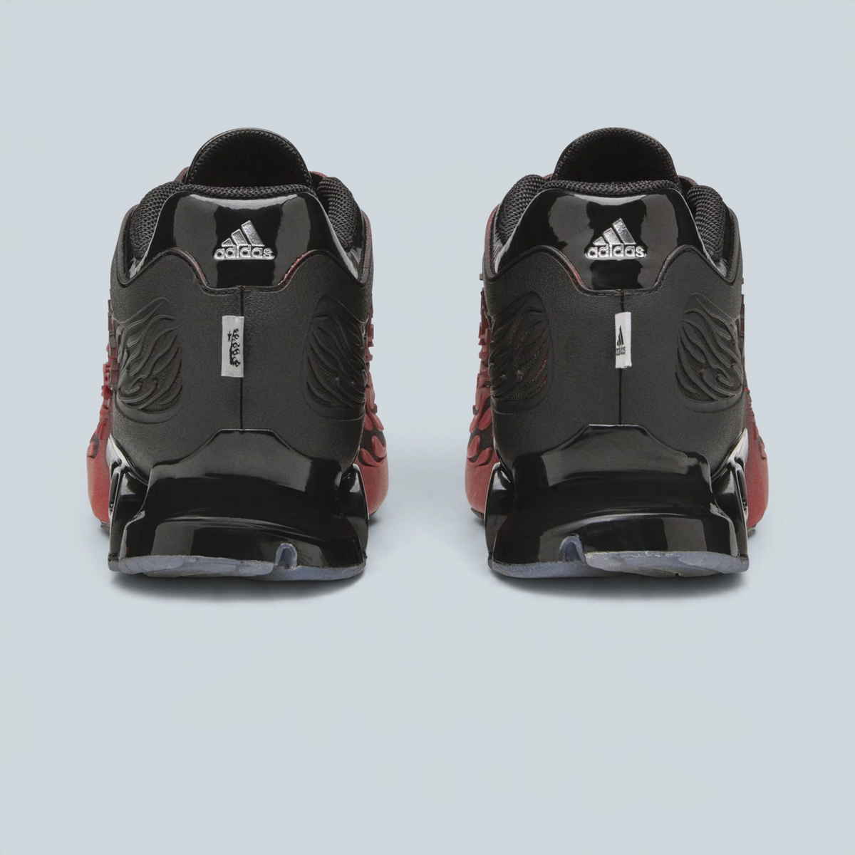Vue arrière des baskets Saison adidas Originals x Hellstar Megaride S en mesh noir, blanc et rouge vif