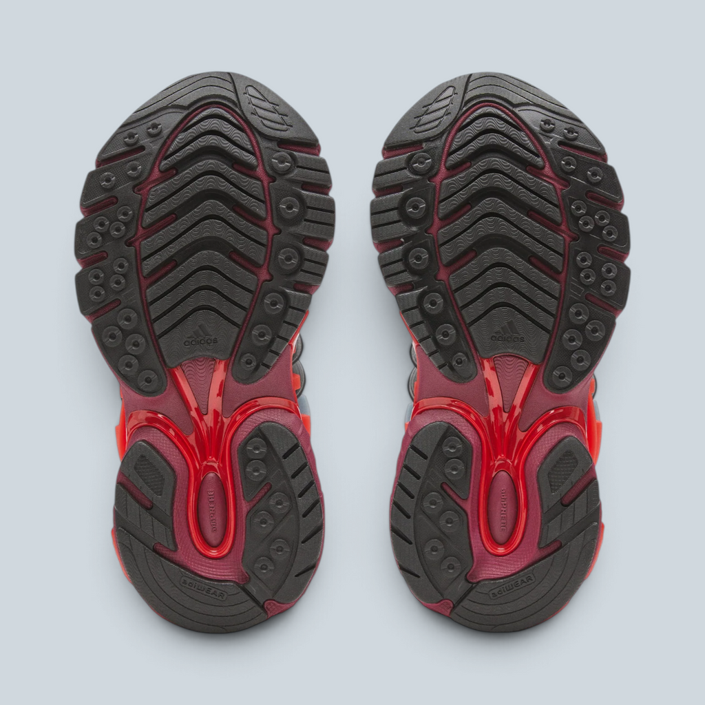 Semelle extérieure en caoutchouc noir et rouge des baskets Saison Adidas Jellyfish Pharrell Williams
