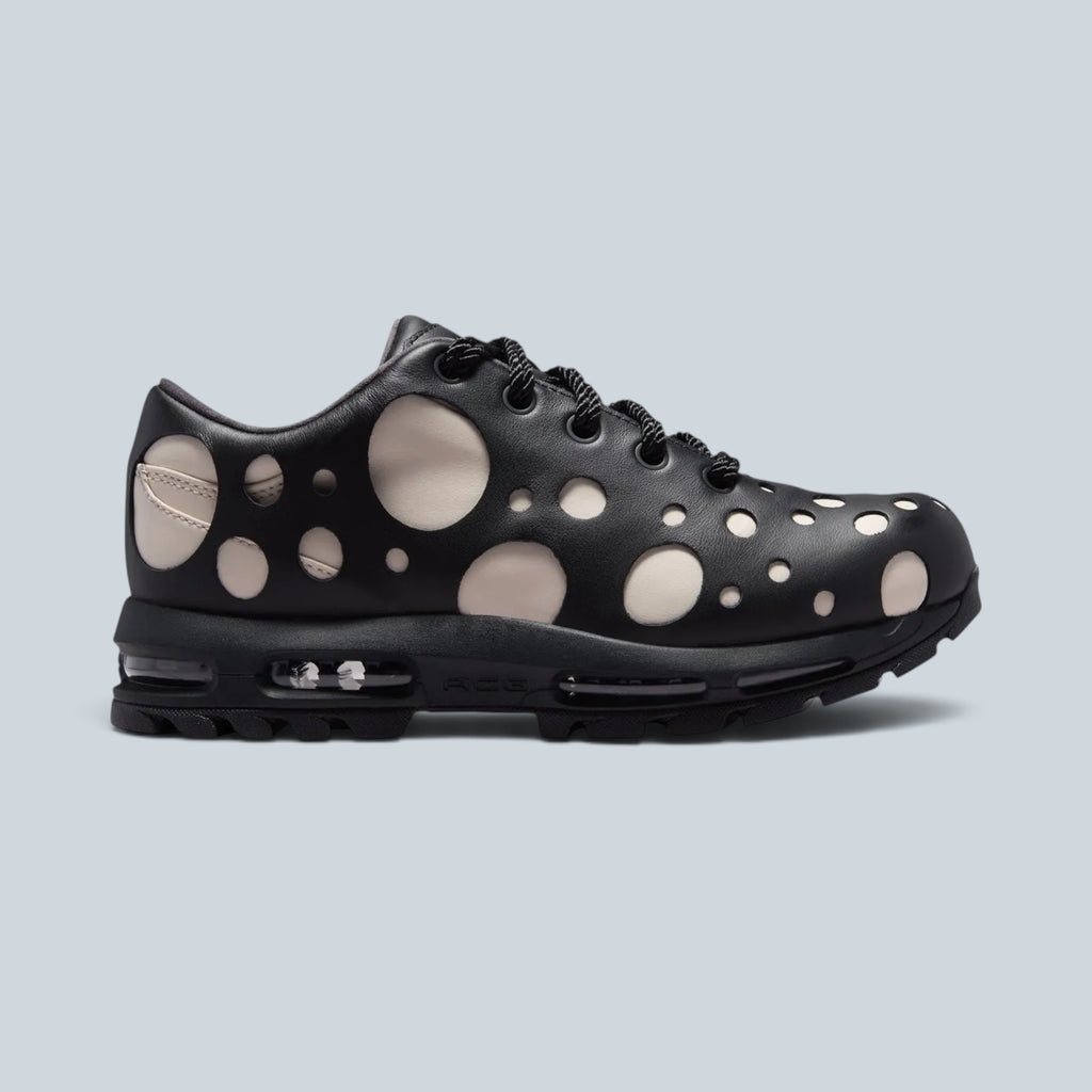 Baskets Saison Air Max Goadome Low en cuir noir et beige avec motif à pois et semelle crantée haute traction
