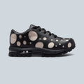 Baskets Saison Air Max Goadome Low en cuir noir et beige avec motif à pois et semelle crantée haute traction