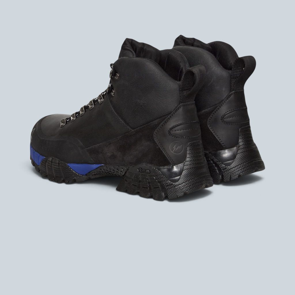 Chaussure de randonnée montante Saison Andreas en cuir noir avec semelle Vibram et détail bleu au talon