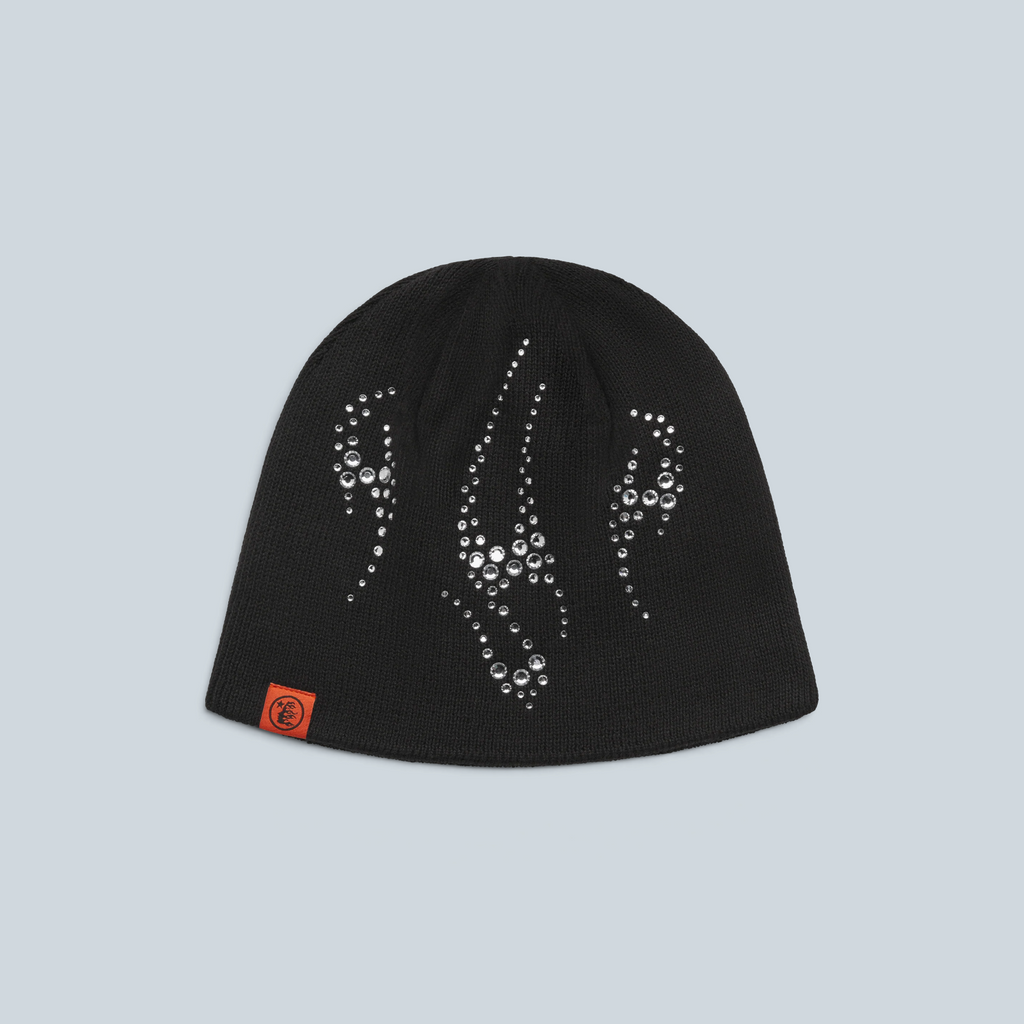 Bonnet Saison Ember noir en maille avec motifs décoratifs en strass et étiquette orange sur le côté