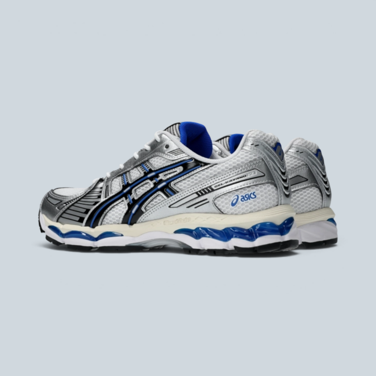 Baskets de running Saison GEL-KAYANO 12.1 blanches et noires avec détails argentés et amorti GEL bleu