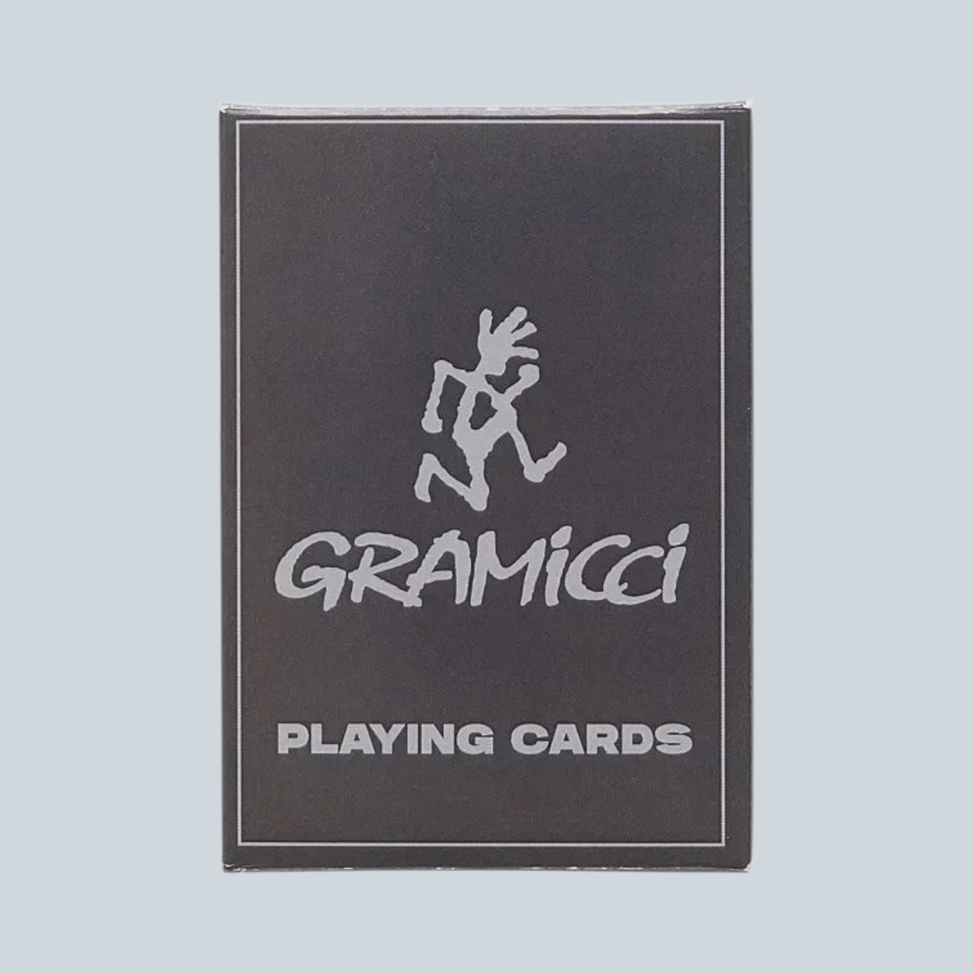 Jeu de cartes Saison Gramicci noir avec logo Running Man blanc sur l'étui en papier