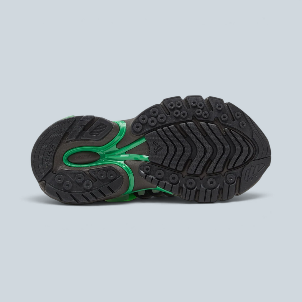 Semelle extérieure noire et verte des baskets Saison Jellyfish avec amorti Adiprene et structure en TPU sculpté