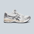 Baskets Saison KAYANO 14 blanches et gris graphite en mesh et cuir synthétique avec amorti GEL et semelle en caoutchouc