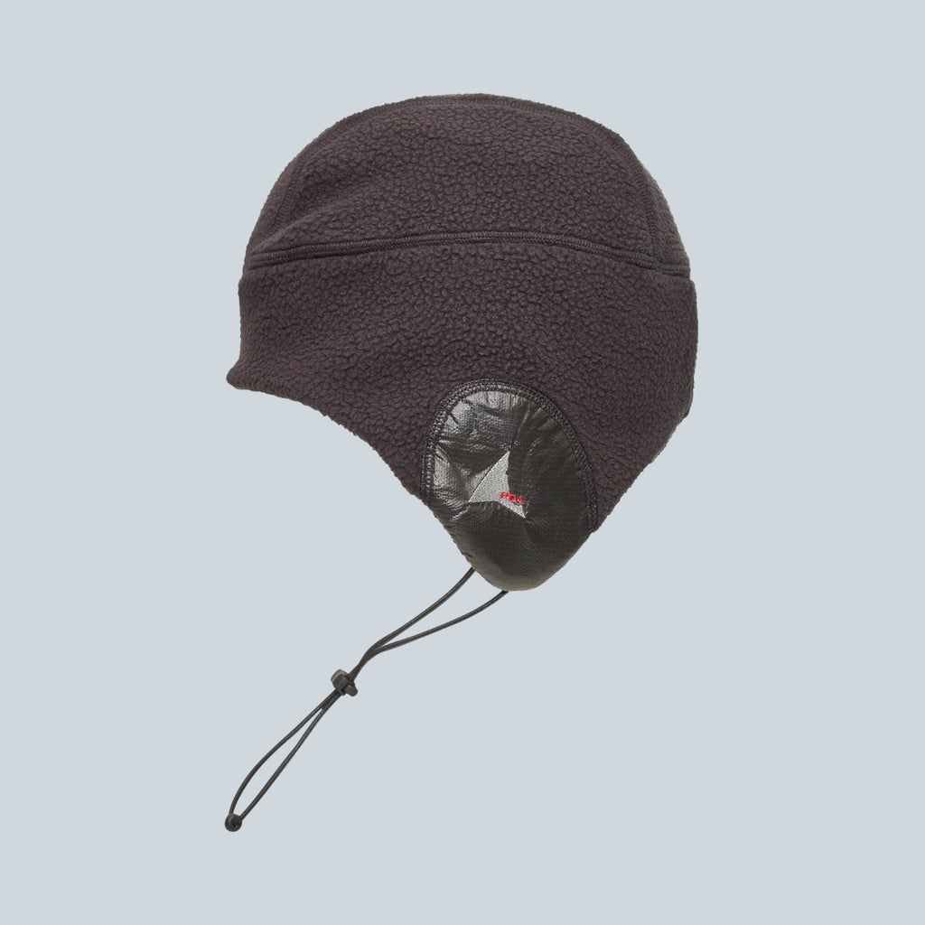 Bonnet aviateur Saison Kogi en polaire Polartec Thermal Pro noire avec rabats et détails en polyamide