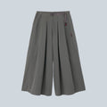 Pantalon évasé Saison en nylon recyclé couleur carbon avec ceinture intégrée et plis marqués