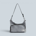 Sac bandoulière Saison The North Face Never Stop gris à motif quadrillé avec sangle réglable et poche zippée
