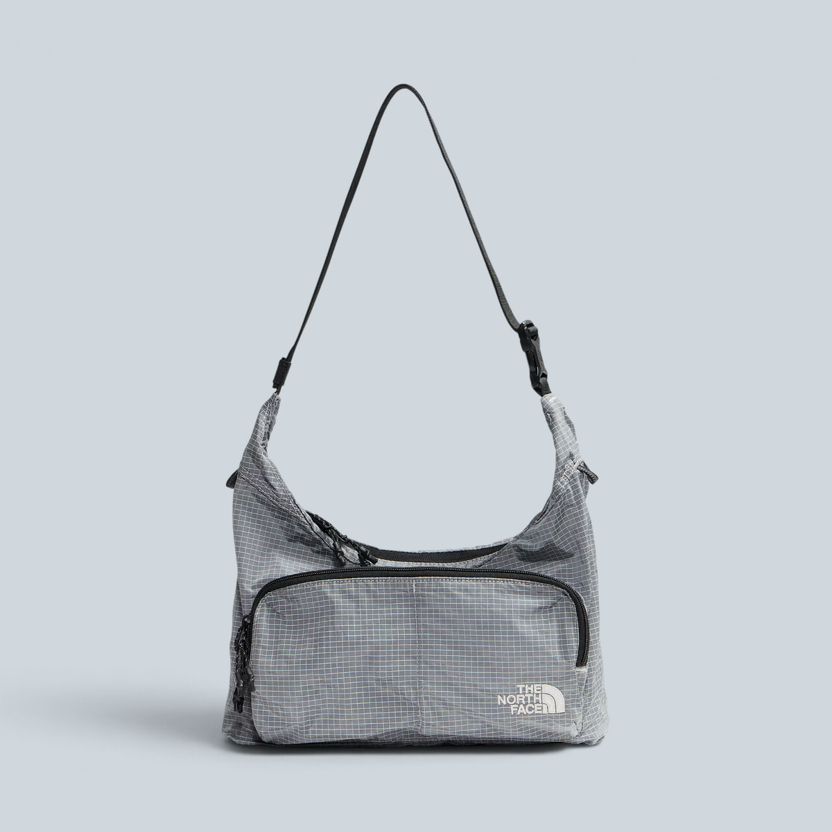 Sac bandoulière Saison The North Face Never Stop gris à motif quadrillé avec sangle réglable et poche zippée