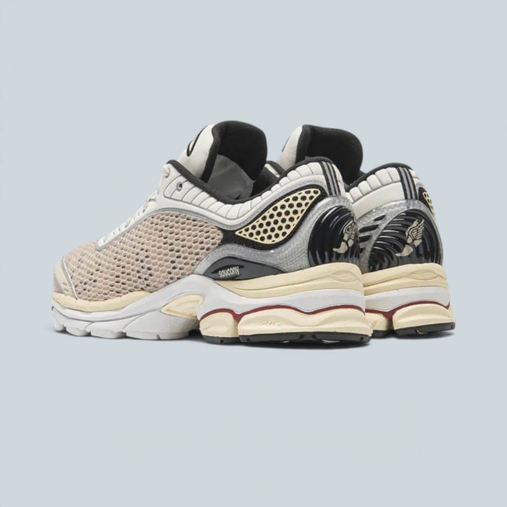 Baskets Saison Saucony ProGrid Paramount OA noires et beiges avec tige en mesh aéré et renfort de talon moulé