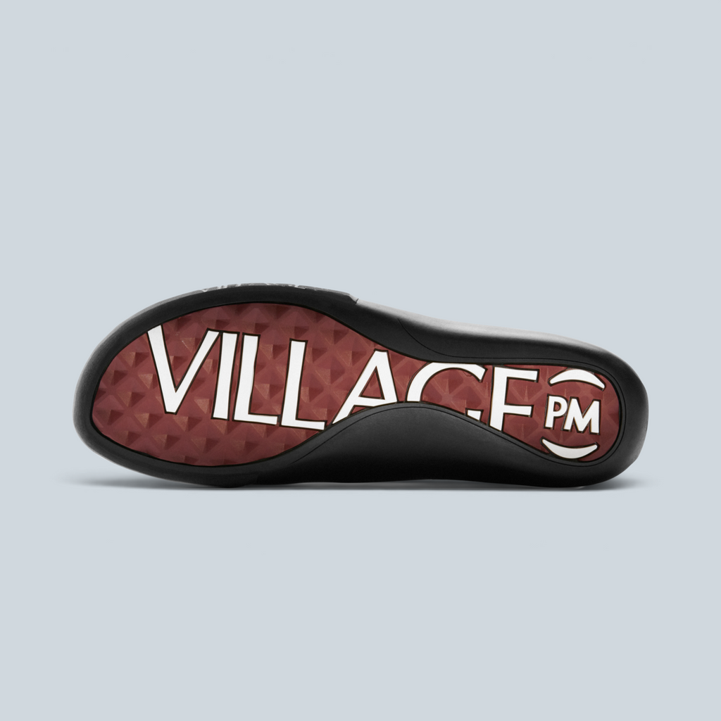 Semelle extérieure bicolore bordeaux et noire de la basket Saison 2PM avec logo Village PM en relief