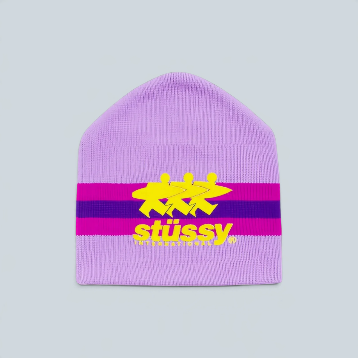 Bonnet Stüssy Stripe Ski violet en acrylique avec logo jaune et bandes contrastées, disponible chez Saison