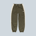 Pantalon de jogging Saison Stüssy en nylon olive avec bandes latérales contrastantes et logo brodé