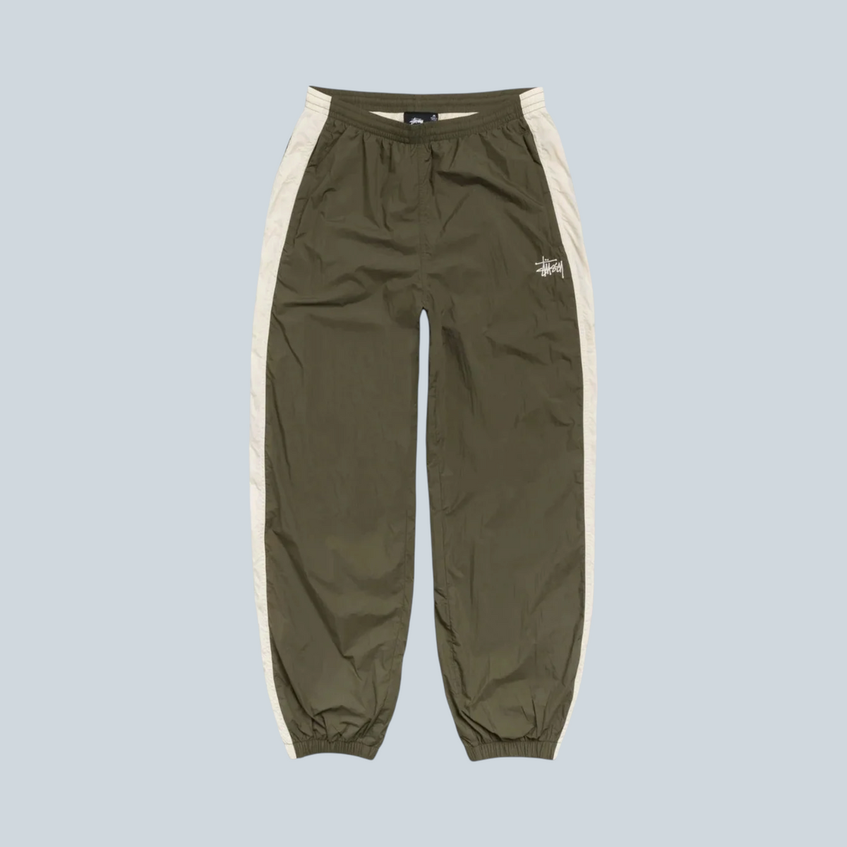 Pantalon de jogging Saison Stüssy en nylon olive avec bandes latérales contrastantes et logo brodé
