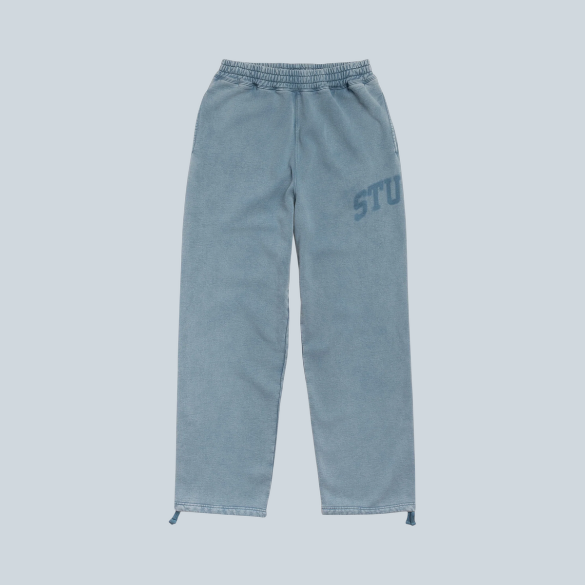 Pantalon de jogging Saison Stüssy en molleton bleu marine délavé avec logo graphique et cordon de serrage