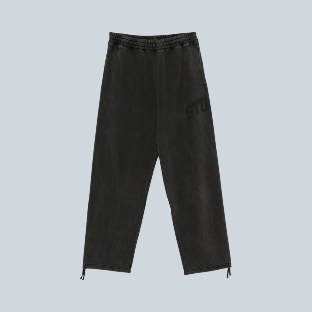 Pantalon de jogging Saison Stüssy en molleton délavé noir avec logo graphique et cordons de serrage aux chevilles