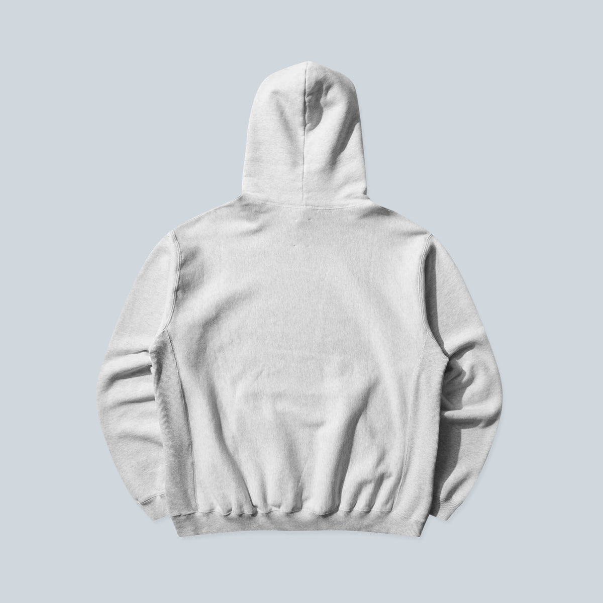 Vue arrière du sweat à capuche Saison en molleton de coton gris clair avec bord-côtes extensibles