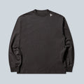 T-shirt manches longues Saison en jersey de coton noir délavé avec petit logo discret sur l'épaule