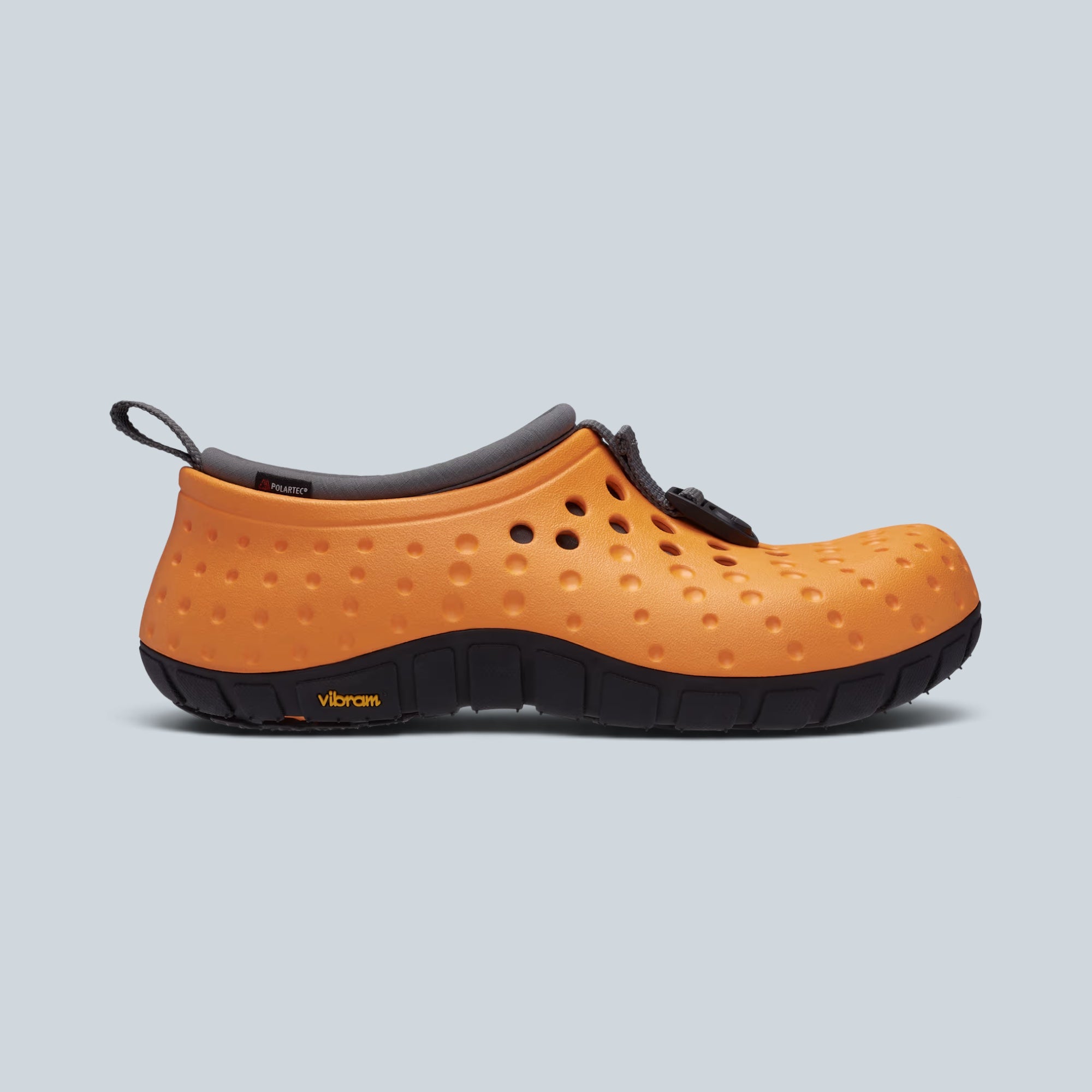 Sabot hybride Saison Tembo II RO orange et noir avec tige en mousse perforée, chausson Polartec et semelle Vibram