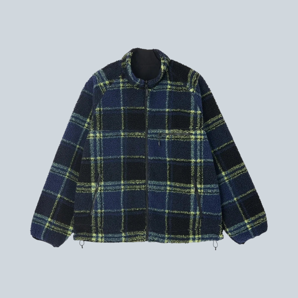 Veste réversible Saison en sherpa à motif écossais bleu et noir avec fermeture éclair et poches latérales