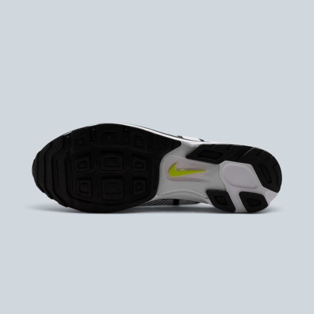 Semelle extérieure noire et blanche de la chaussure de running Saison ZOOM STREAK 3 avec logo volt